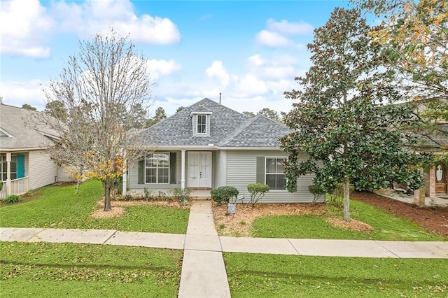 view of front of home with a front yard