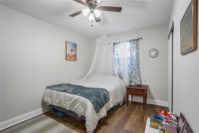 bedroom featuring hardwood / wood-style flooring and ceiling fan