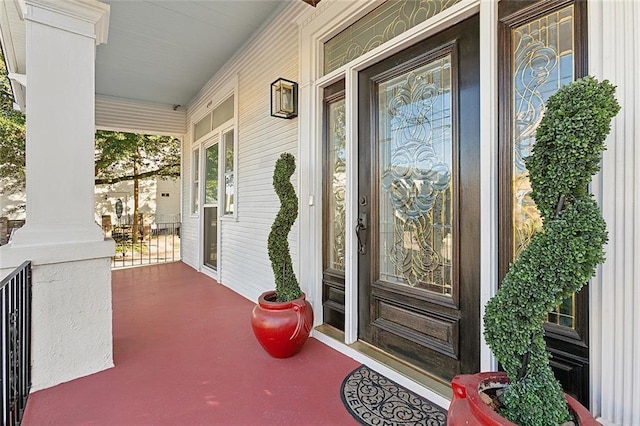 doorway to property featuring a porch