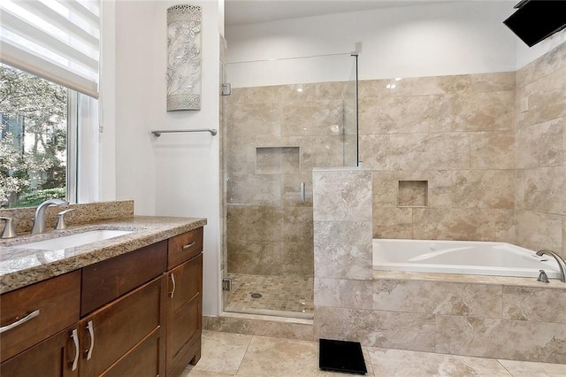 bathroom with vanity, tile patterned floors, and independent shower and bath