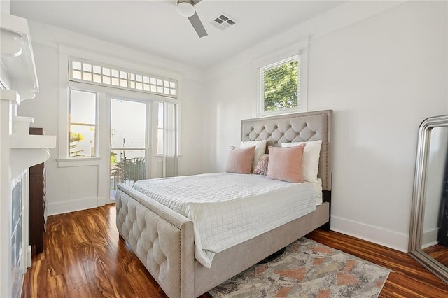 bedroom featuring ceiling fan and dark hardwood / wood-style flooring