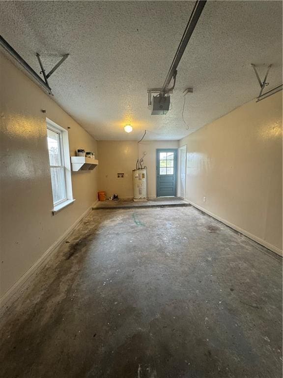 garage with water heater and a garage door opener