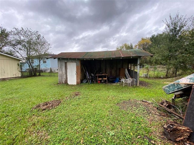 view of outdoor structure featuring a yard