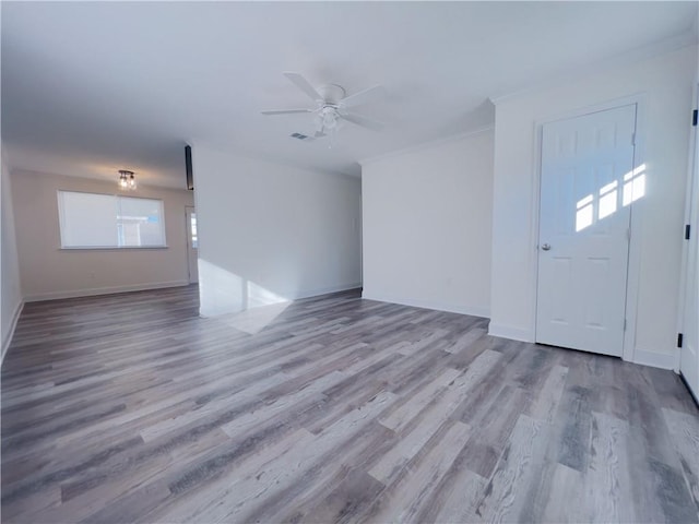 foyer featuring ceiling fan and light hardwood / wood-style flooring