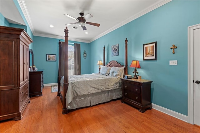 bedroom with light hardwood / wood-style flooring, ceiling fan, and crown molding