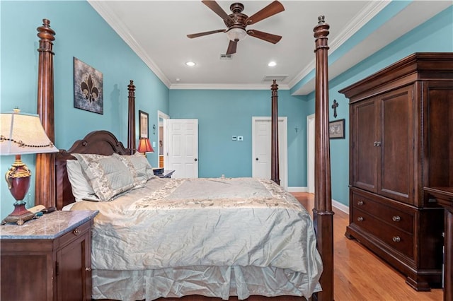 41212 Happywoods Rd, Hammond, LA 70403 - bedroom with crown molding, light wood-style flooring, recessed lighting, baseboards, and a ceiling fan