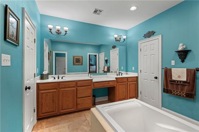 full bath featuring a bath, double vanity, visible vents, and a sink