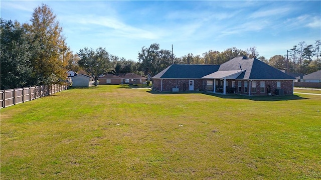view of yard with fence