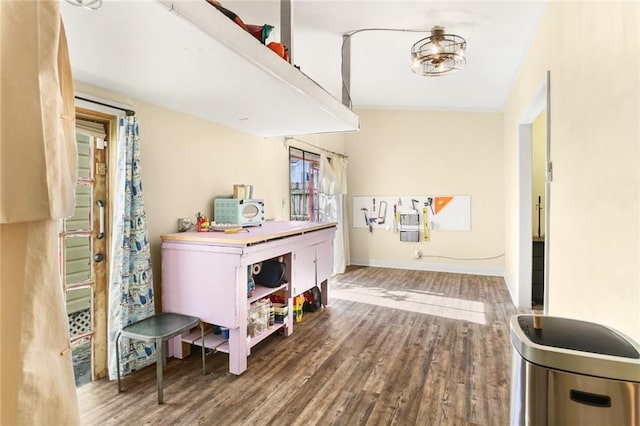 hallway featuring hardwood / wood-style floors and a healthy amount of sunlight