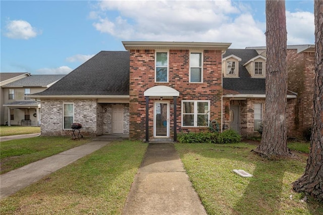 view of front facade with a front yard