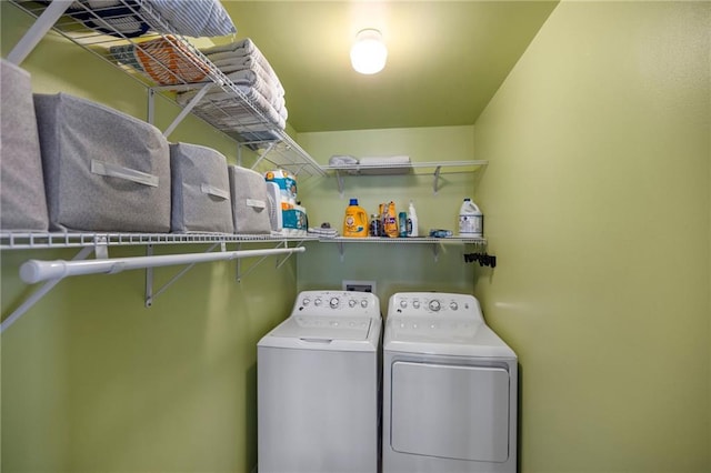 washroom with separate washer and dryer