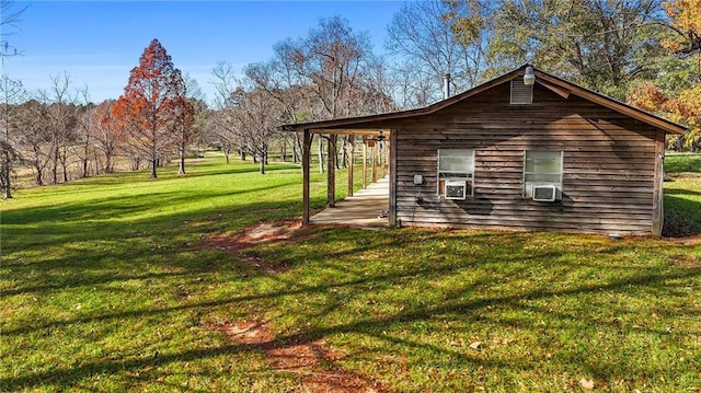 view of property exterior featuring a yard and cooling unit