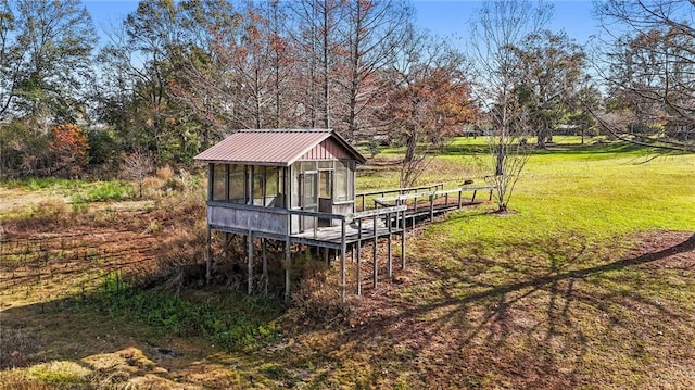 exterior space with a yard and an outdoor structure