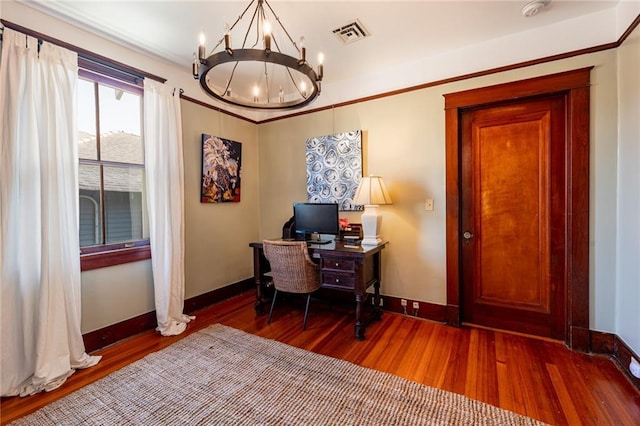 office with hardwood / wood-style floors and a chandelier