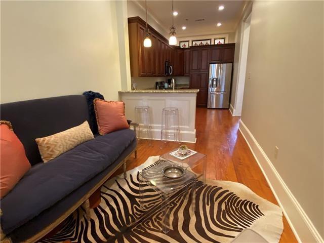 living room featuring dark hardwood / wood-style floors