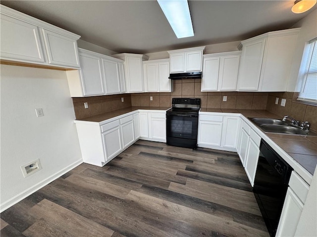 kitchen featuring black appliances, sink, tasteful backsplash, tile counters, and white cabinetry