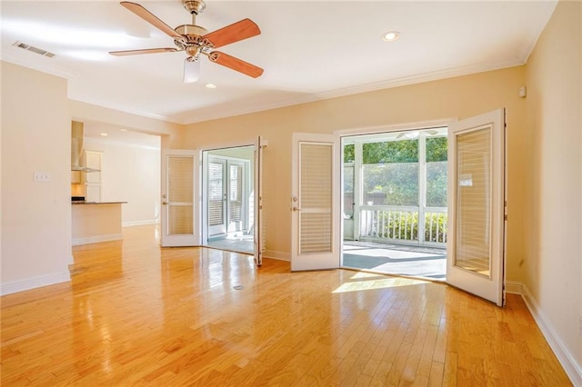 5913 Catina St, New Orleans, LA 70124 - empty room featuring ornamental molding, light wood-type flooring, ceiling fan, recessed lighting, and french doors