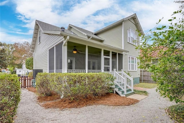5913 Catina St, New Orleans, LA 70124 - view of home's exterior featuring a sunroom and ceiling fan