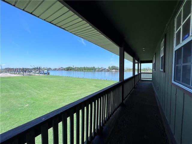 800 Anna St, Lafitte, LA 70067 - balcony featuring a water view