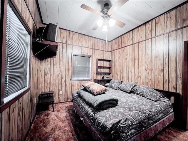 800 Anna St, Lafitte, LA 70067 - bedroom with wooden walls and carpet flooring