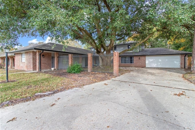1318 Independence Dr, Slidell, LA 70458 - view of front of property with a garage and a front lawn