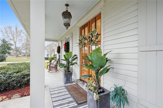 doorway to property with a porch