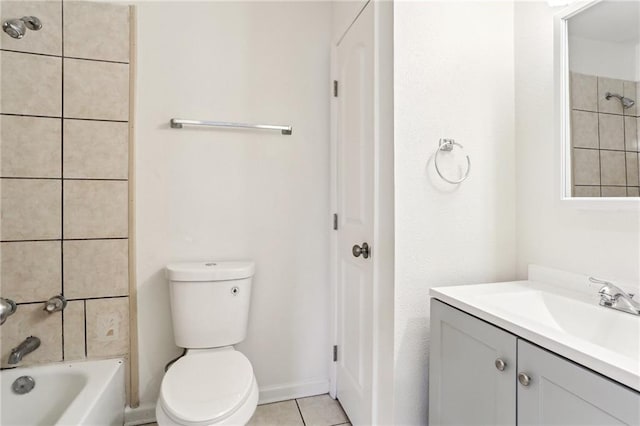 full bathroom with tile patterned flooring, vanity, toilet, and tiled shower / bath combo