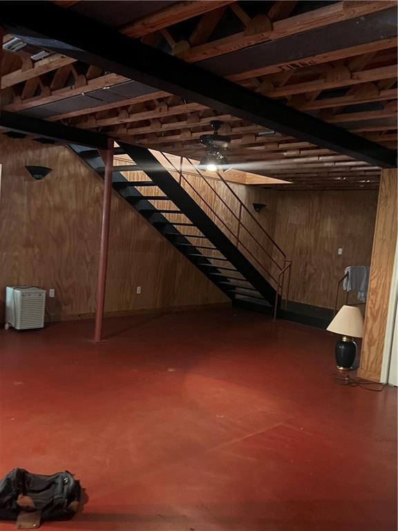 basement with wood walls