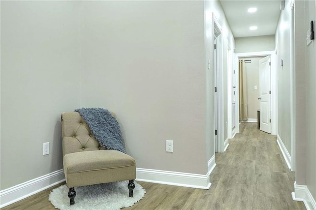 living area with light hardwood / wood-style floors