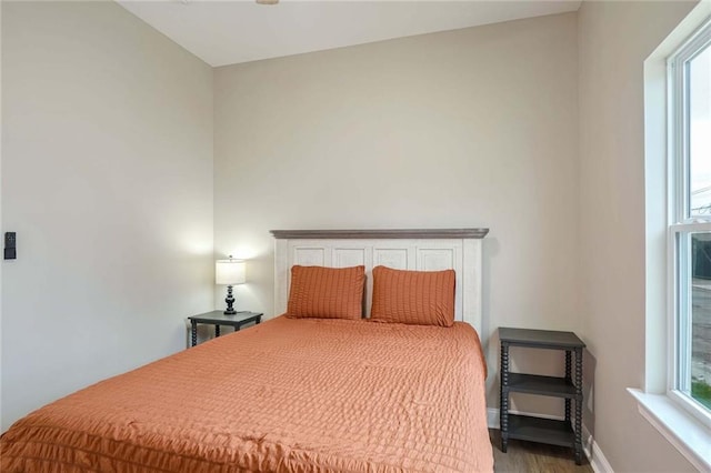 bedroom featuring hardwood / wood-style floors