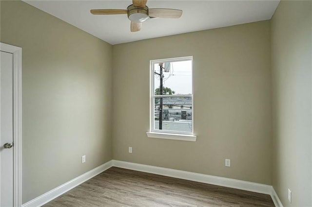 unfurnished room featuring ceiling fan and light hardwood / wood-style floors