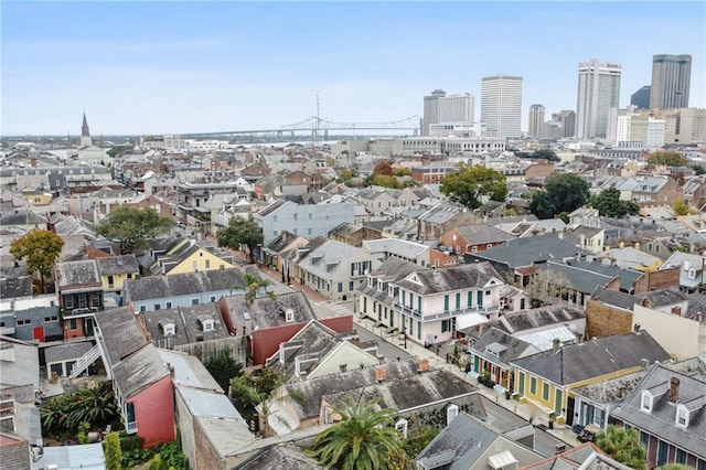 birds eye view of property featuring a city view