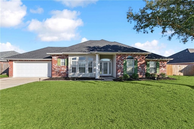 ranch-style house with a front lawn and a garage