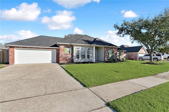 ranch-style home featuring a garage and a front lawn