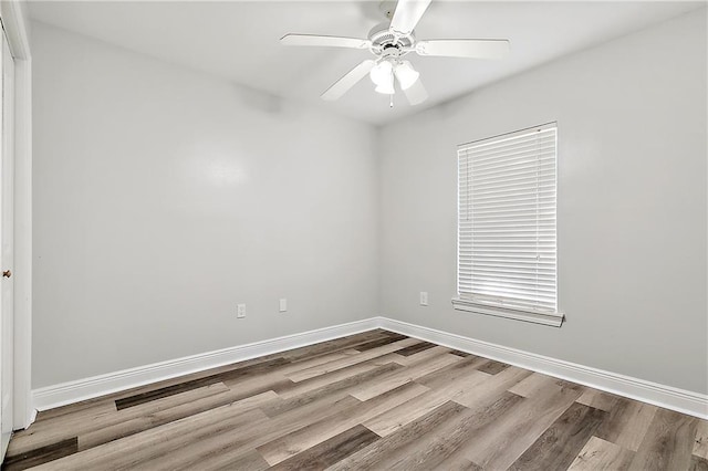 unfurnished room with ceiling fan and light hardwood / wood-style floors