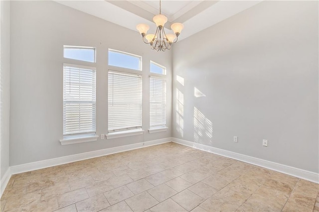 unfurnished room featuring light tile patterned flooring and a notable chandelier