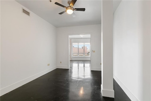 unfurnished room with ceiling fan