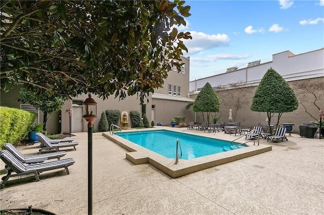 view of pool with a patio