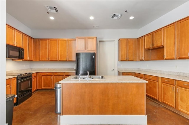 kitchen with sink, a center island with sink, and black appliances