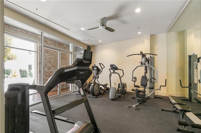 exercise room with ceiling fan