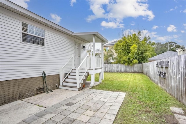 view of yard with a patio area