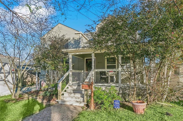 bungalow-style home featuring covered porch