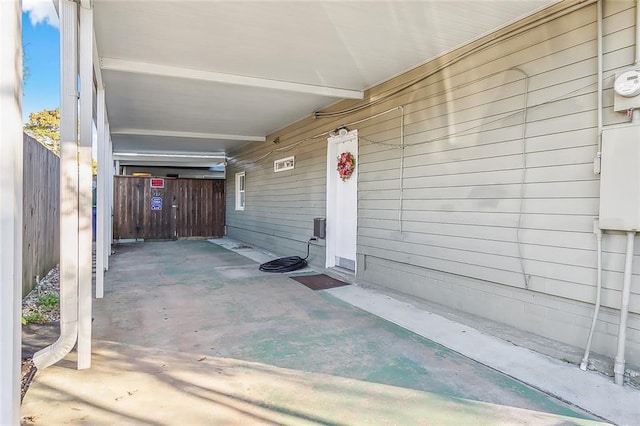 view of patio / terrace with a carport