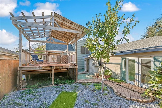 exterior space featuring french doors and a deck