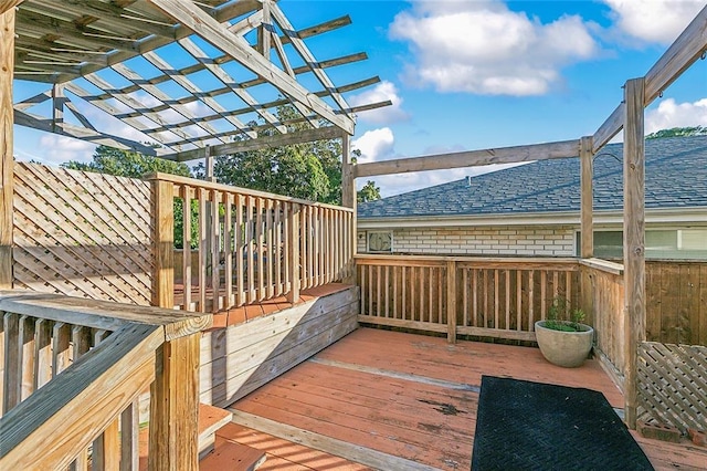 wooden terrace featuring a pergola and a water view