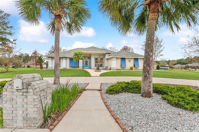 view of front of house with a front yard