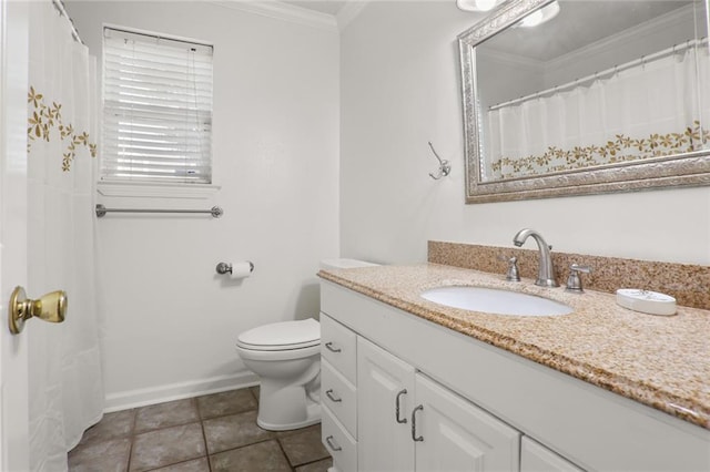 bathroom featuring tile patterned floors, vanity, toilet, and ornamental molding