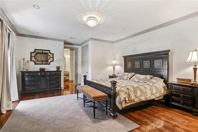 bedroom featuring dark hardwood / wood-style floors and ornamental molding