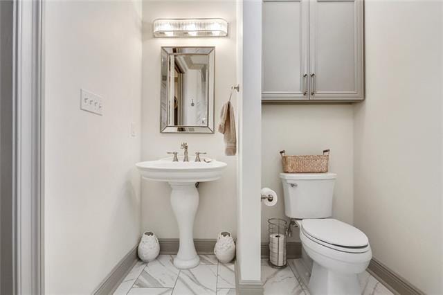 bathroom featuring toilet