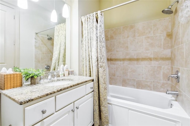 bathroom featuring vanity and shower / tub combo